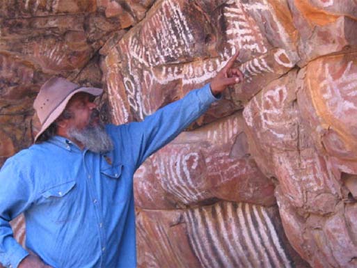 Fig. 72. White-striped pictographs at Iga Warta Cultural Tourism Centre, North Flinders Range (30.59° S, 138.94° E). Shown is Cliff Coulthard, Australian Department of Environment and Planning in Aboriginal Heritage, an authority on pictograph painting techniques having analyzed such works as the Magdalenian cave art in France.